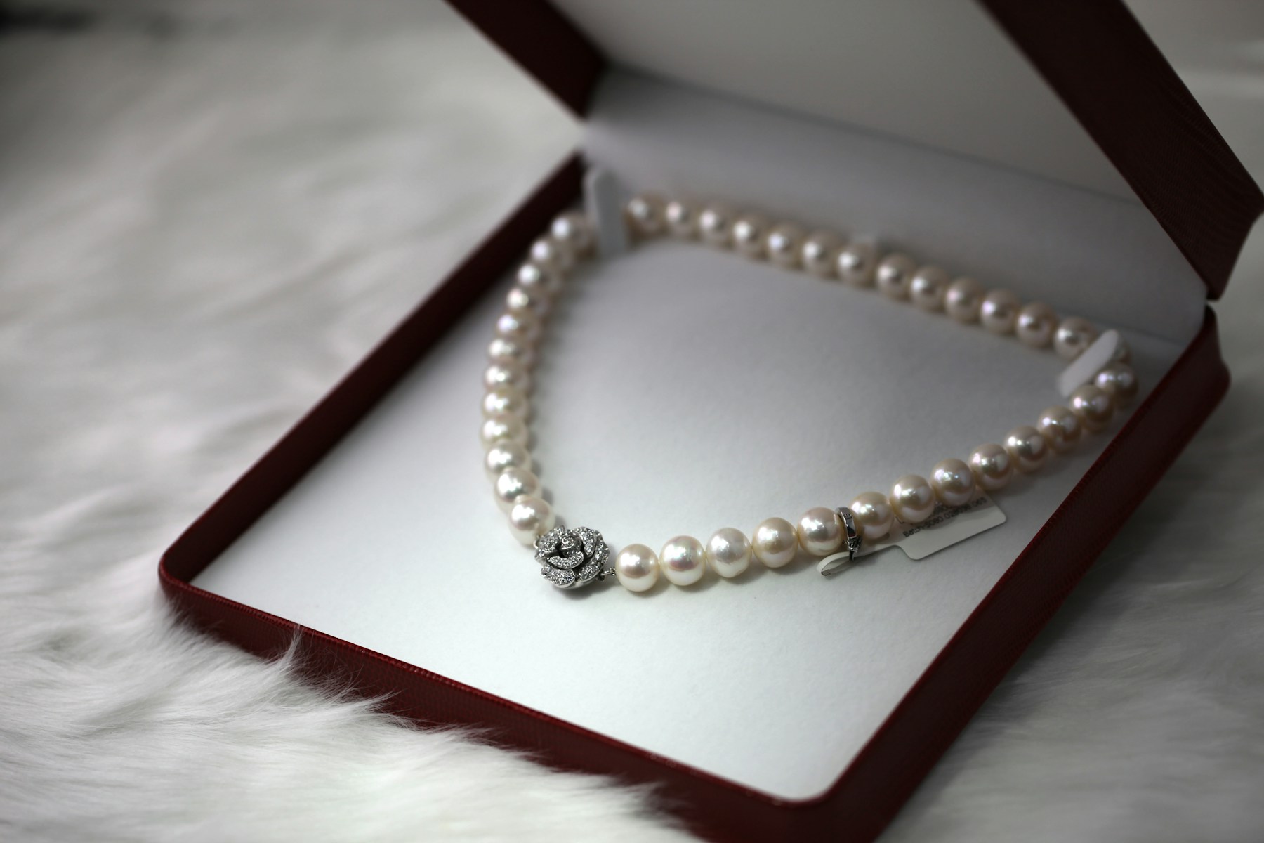 Fine gold necklace with diamonds on soft light